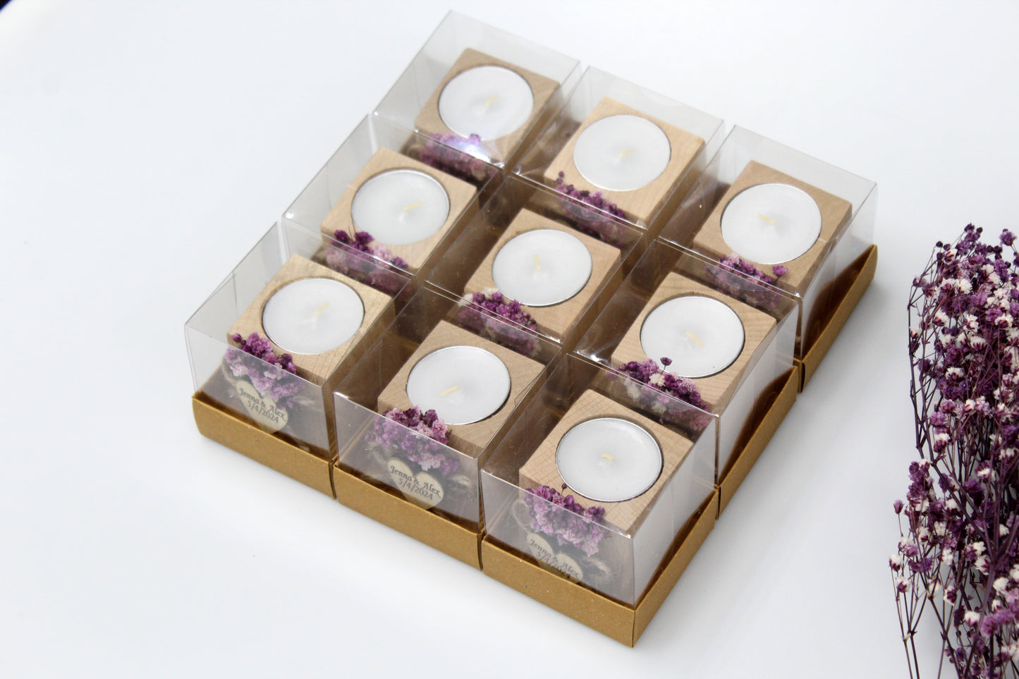 Personalized wooden candle holder wedding favors in clear packaging with purple dried flowers, displayed in a 3x3 grid arrangement.