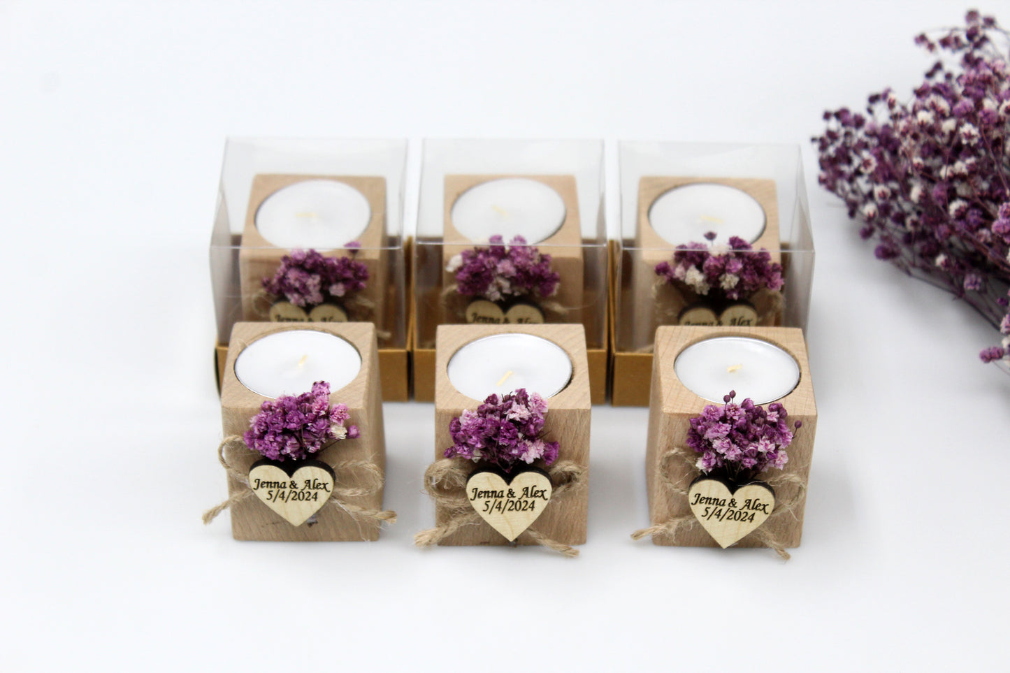 Personalized wooden candle holder wedding favors with purple dried flowers, featuring customizable names and date, displayed in a 3x2 arrangement, some in clear packaging and some without